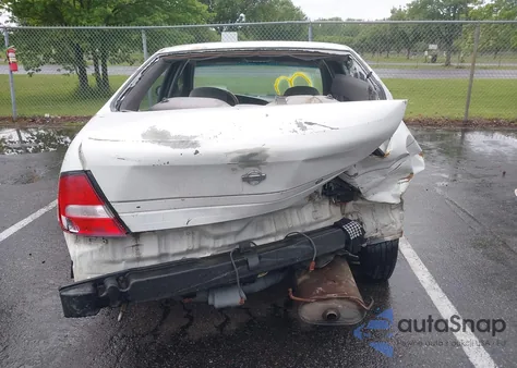 2001 Nissan Altima Gxe z USA, uszkodzony, nr VIN 1N4DL01D01C117464